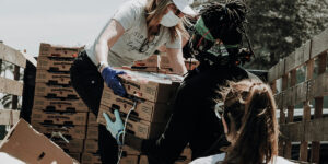 Volunteers moving supplies