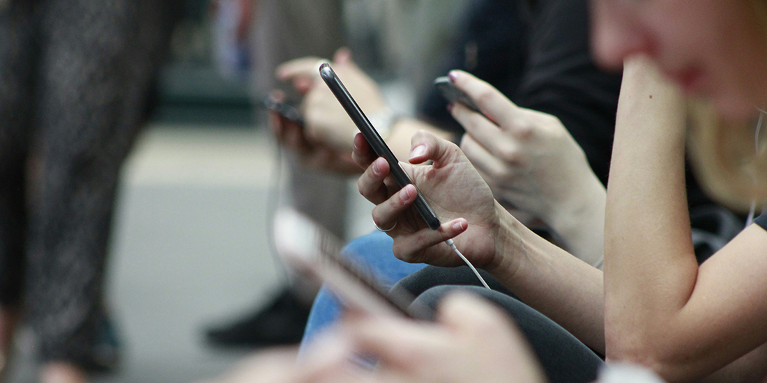 hands holding cellphones