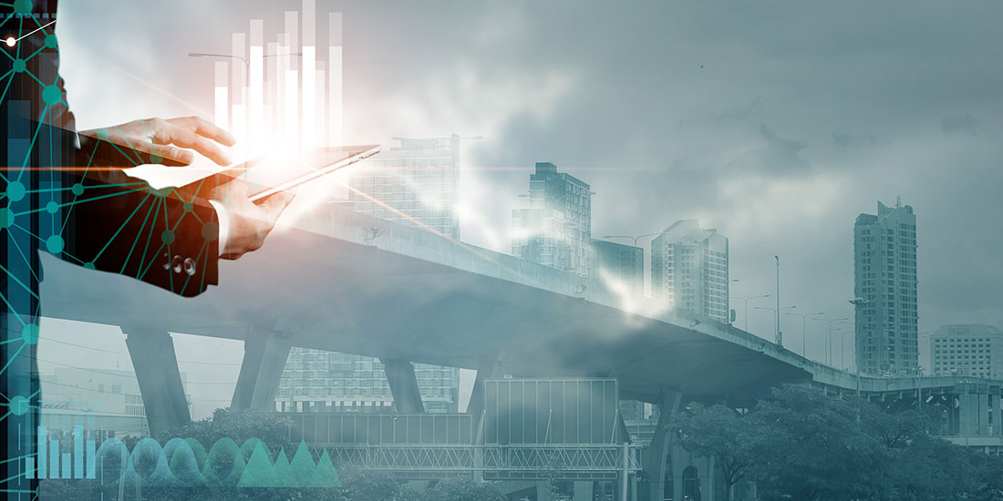 Double exposure of graph chart and network connection on businessman using tablet analyzing sales data and economic growth on citiy background. Business and digital technology.