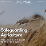 March cover of the Domestic Preparedness Journal, which states "Safeguarding Agriculture: Preparing for Threats to the Food Supply." The background picture is a wheat field blowing in the wind with a clear sky