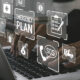 floating emergency concept buttons above laptop keyboard, hand on keyboard